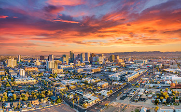 Phoenix, AZ, downtown skyline at sunset.